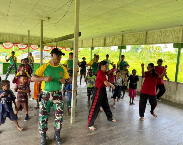 Tingkatkan Imunitas Tubuh Anak, Satgas Yonif 503/Mayangkara Ajak Senam Bersama