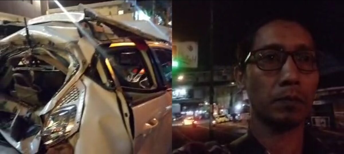 Reporter Kabarterdepan.com, Eko Sabdianto langsung meliput di TKP Bus Pariwisata yang diduga blong hingga menabrak sejumlah pengendara, tampak satu mobil ringsek (Yan / Kabarterdepan.com) 