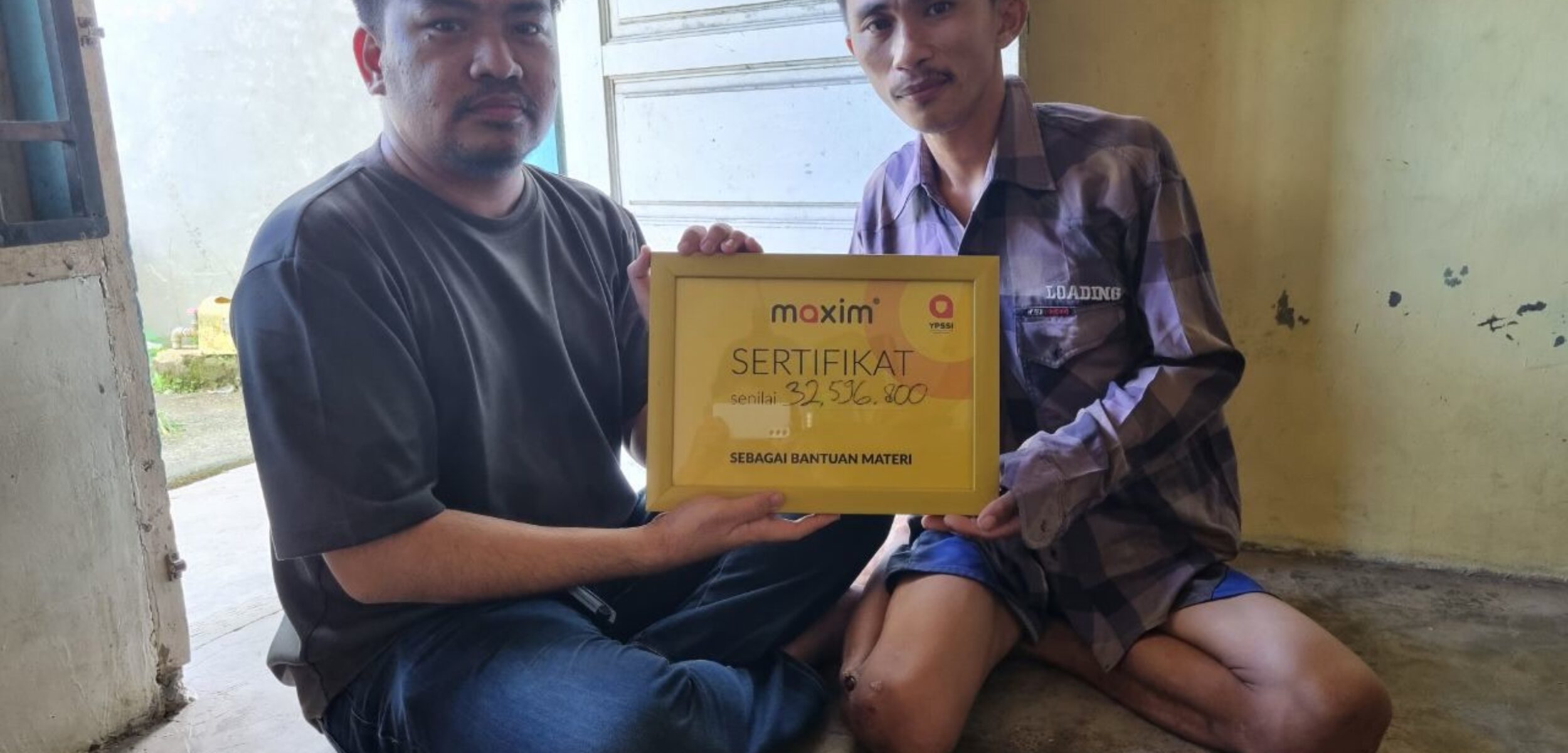Seorang Mitra Pengemudi Maxim DI Padang Terima Santunan Rp32.000.000 Dari YPSSI