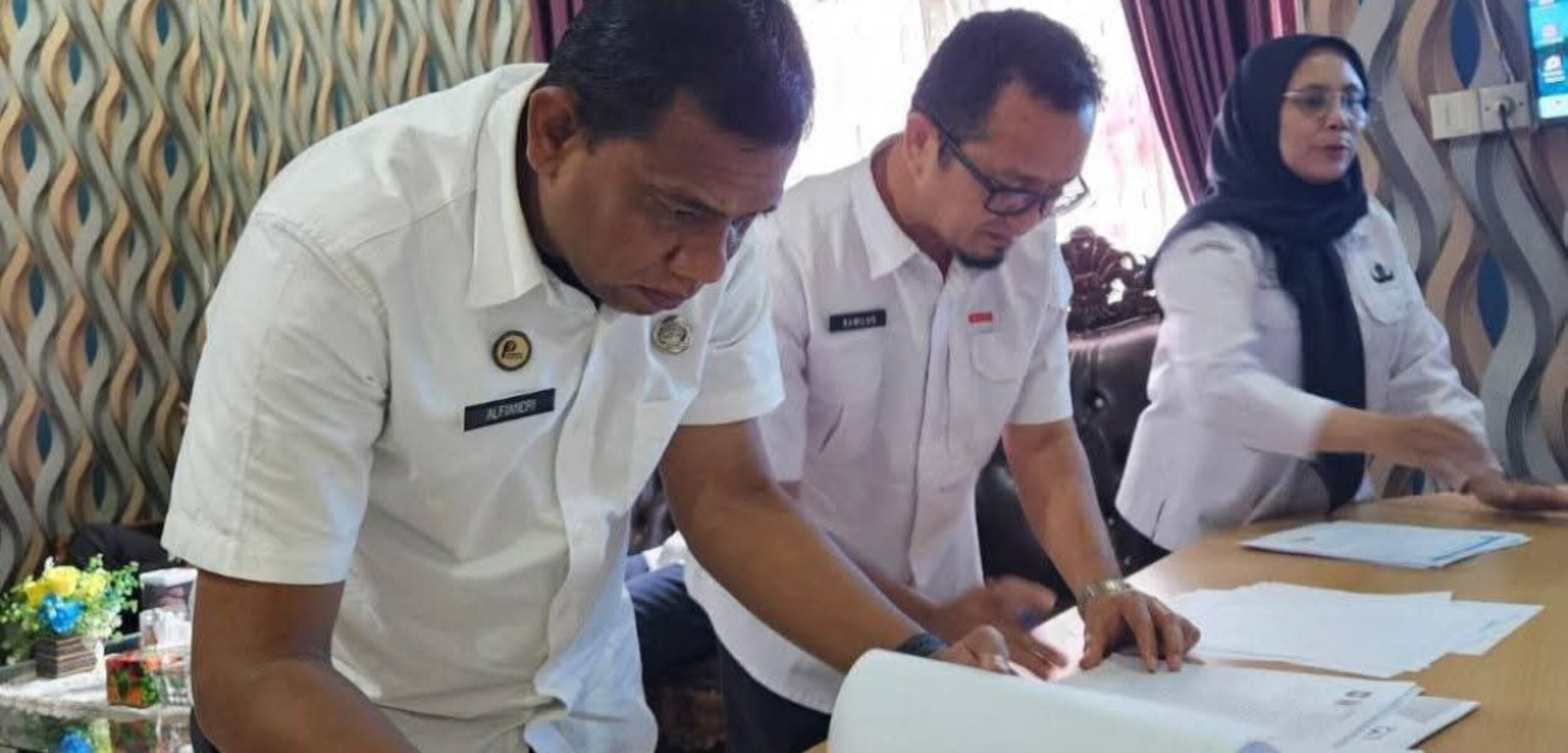 Screenshot 20260222 130025 1 Teken kerja sama data Kependudukan bDisdukcapil Kabupaten Dharmasraya dengan 7 OPD. (Andhika Putra/kabarterdepan.com)